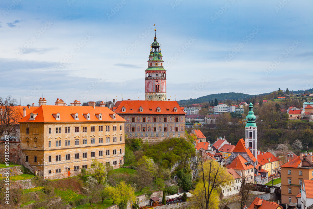 Aerial view of old town and the castle of Cesky Krumlov, Czech republic. Bright spring time. Aerial view of old town and the castle of Cesky Krumlov, Czech republic. Bright spring time.