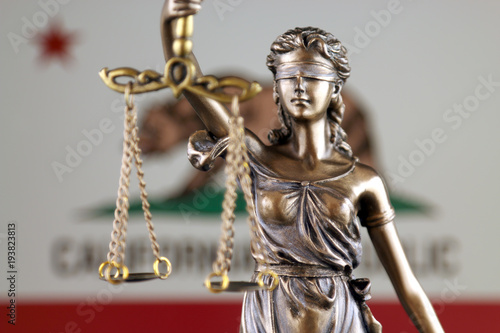 Symbol of law and justice with California State Flag. Close up.
