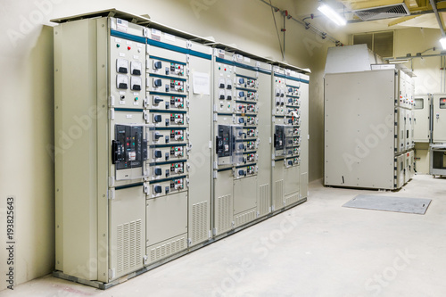 Electrical Room, medium and high voltage switcher, equipment, panel to control and protect the electrical equipment and system by fuse, circuit breaker, control panel at power factory, power plant and