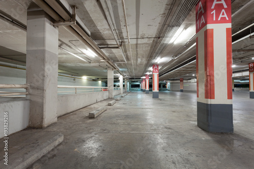 Modern empty parking garage interior in apartment or in supermarket.