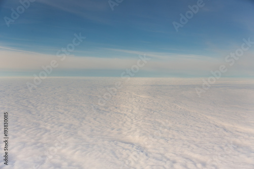 white fluffy clouds and blue sky