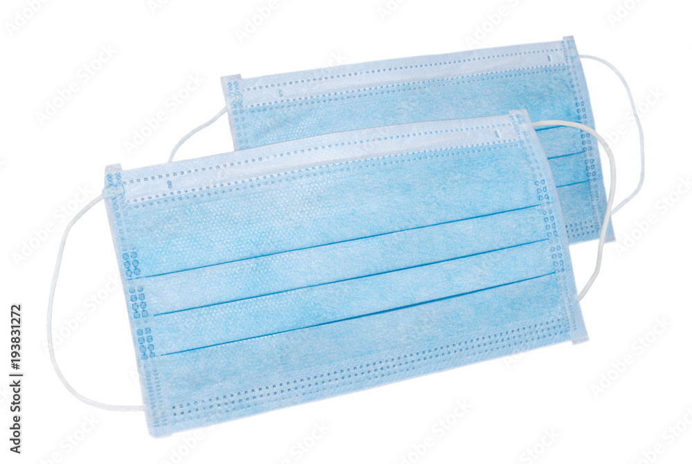 Pair of medical protective masks isolated on white background Pair of medical protective masks isolated on white background