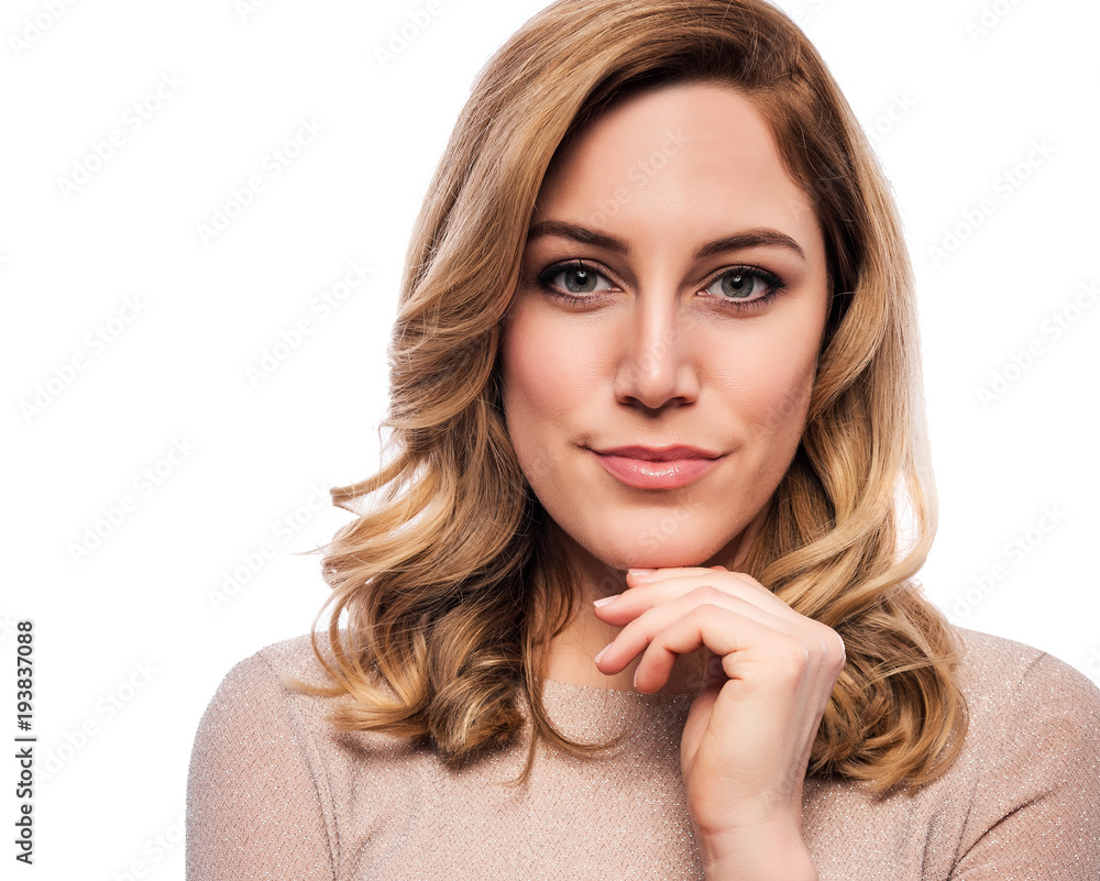 Attractive cute blonde. Close-up portrait on a white. Beautiful young woman in a flesh-colored dress. Attractive cute blonde. Close-up portrait on a white. Beautiful young woman in a flesh-colored dress.