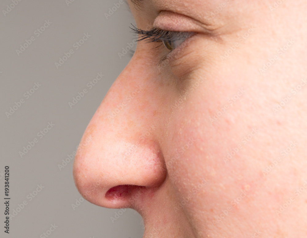 Macro of nose of woman Macro of nose of woman