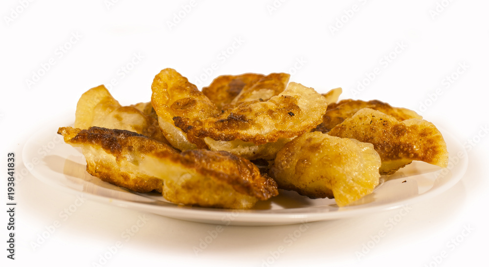 Delicious little pasties on white isolated background. Delicious little pasties on white isolated background.