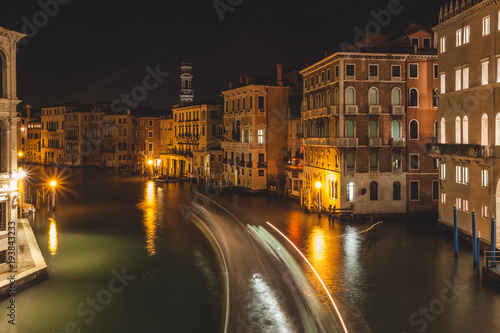 Games of light on the illuminated Grand Canal in the evening, Venice, Italy