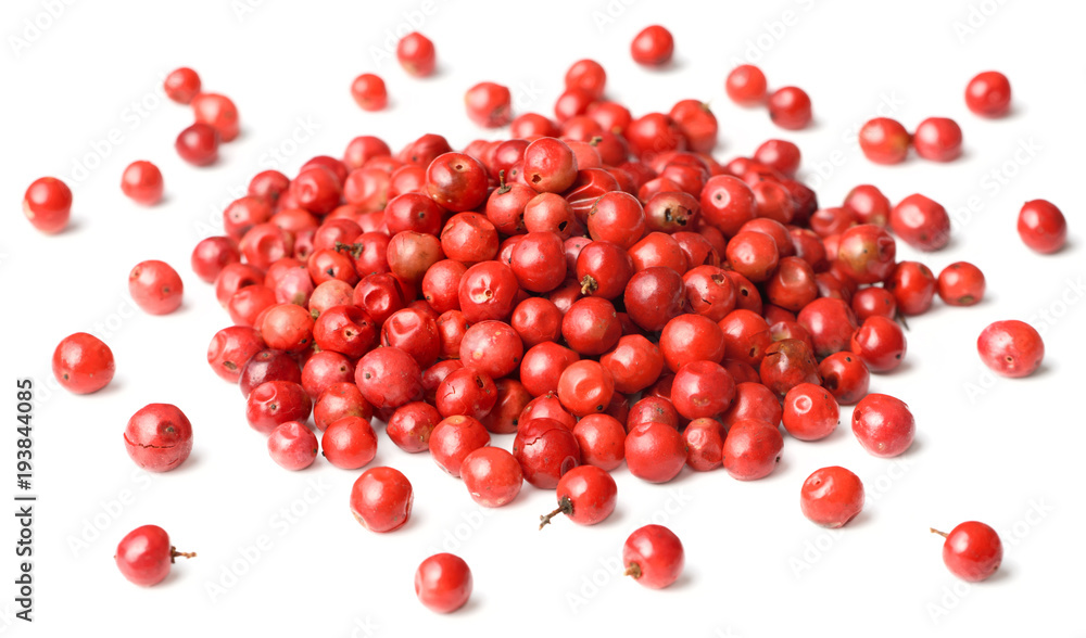 dried pink peppers isolated on white dried pink peppers isolated on white