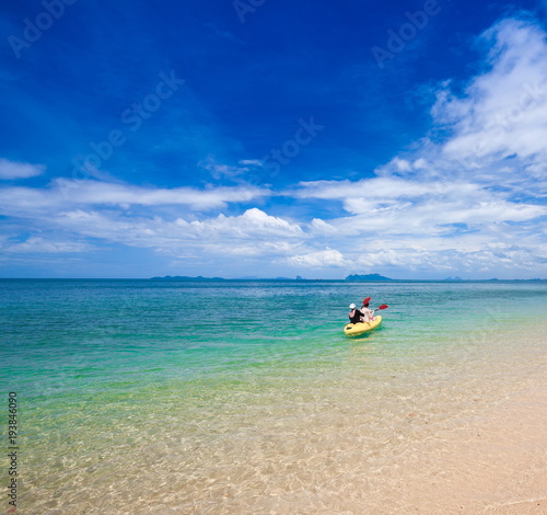 Thailand. Sea Phi Phi, woman and man kayaking
