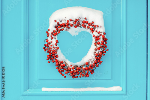 Wreath in red rowan berries...