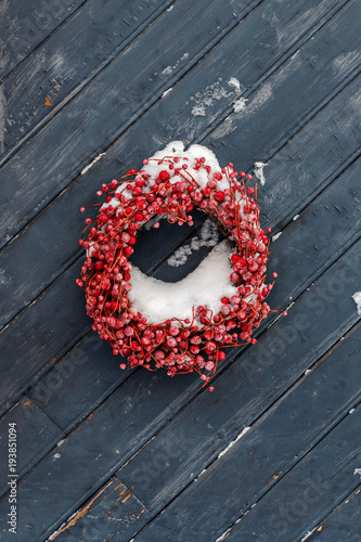 Wreath in red rowan berries...