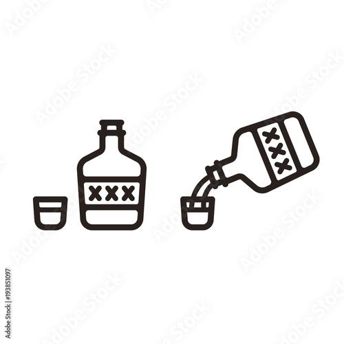Liquor bottle and shot glass