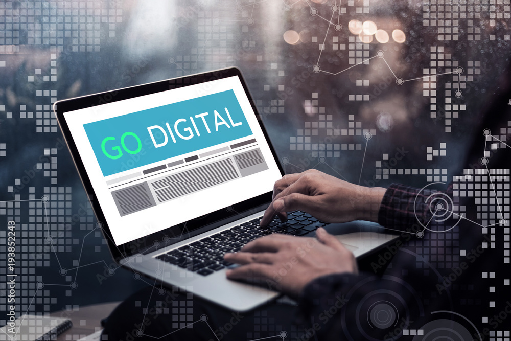 Go digital marketing concepts ideas with male hand using laptop and chart interface. Go digital marketing concepts ideas with male hand using laptop and chart interface.