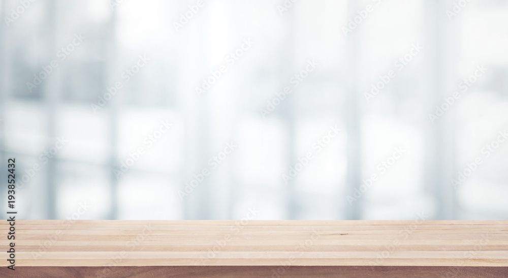 Wood table top on white abstract background form office building. Wood table top on white abstract background form office building.