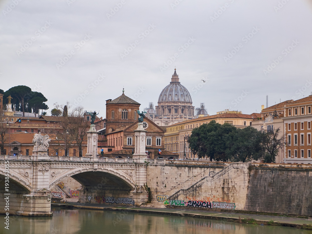 View from Tiber River towards the Papal Basilica of St. Peter in Vatican City. Rome, Italy