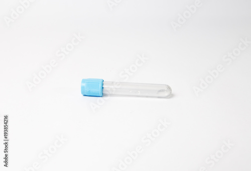 isolated blue blood testing tube lying on the white background