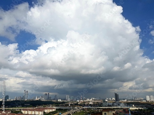 Big huge clouds covering over Johor Bahru's cityscape as storm is approaching in the afternoon © teriztdh