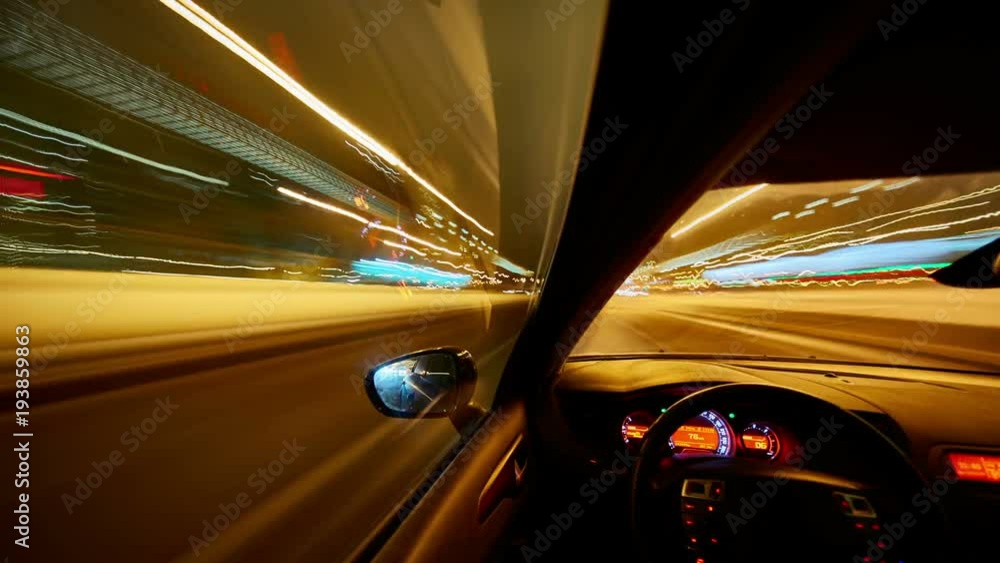 Timelapse video View from Side of Car moving in a winter night city ...