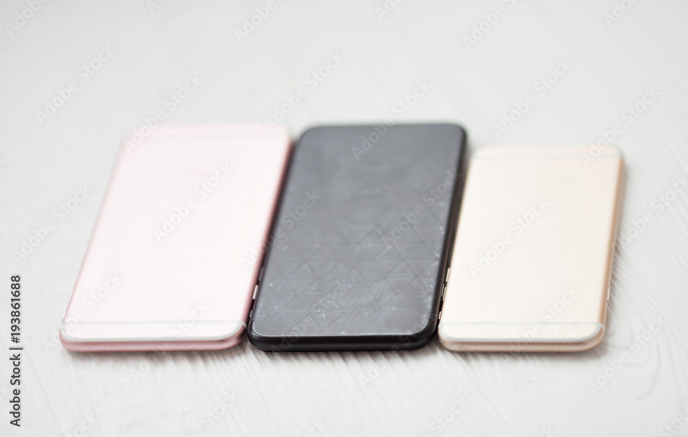 Smart phone on wooden table background with copy space Smart phone on wooden table background with copy space
