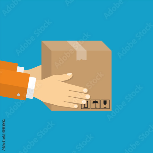 Hand holding package. Delivery concept. Flat design style