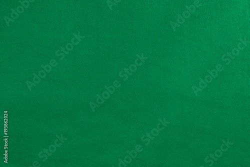 empty green velvet cover on the pool table