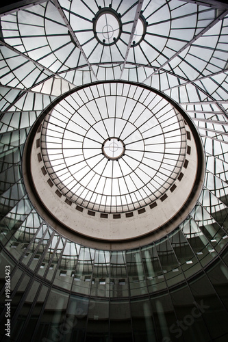 Geometric construction of glass and concrete in frankfurt, germany. Round glass dome. reflections, sector, segment, sphere, sphere, cylindrical shap