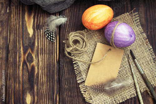 preparation for coloring Easter eggs on a wooden table