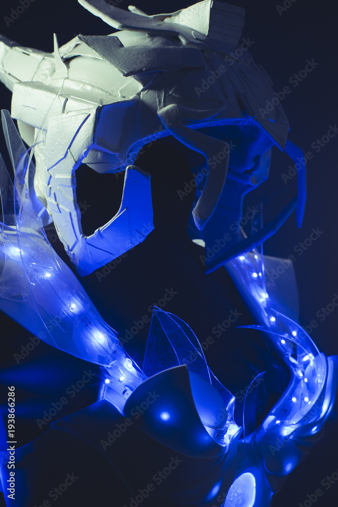 Robotic, blue corset made by hand with plastic pieces and blue colored LEDs. robot of the future with space and futuristic helmet Robotic, blue corset made by hand with plastic pieces and blue colored LEDs. robot of the future with space and futuristic helmet