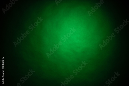 Green light on black background