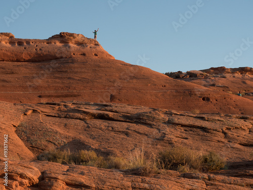 Boy on sandstone rock