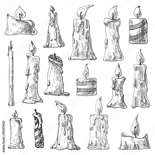 Hand drawn set of burning candles. Vector illustration of a sketch style.