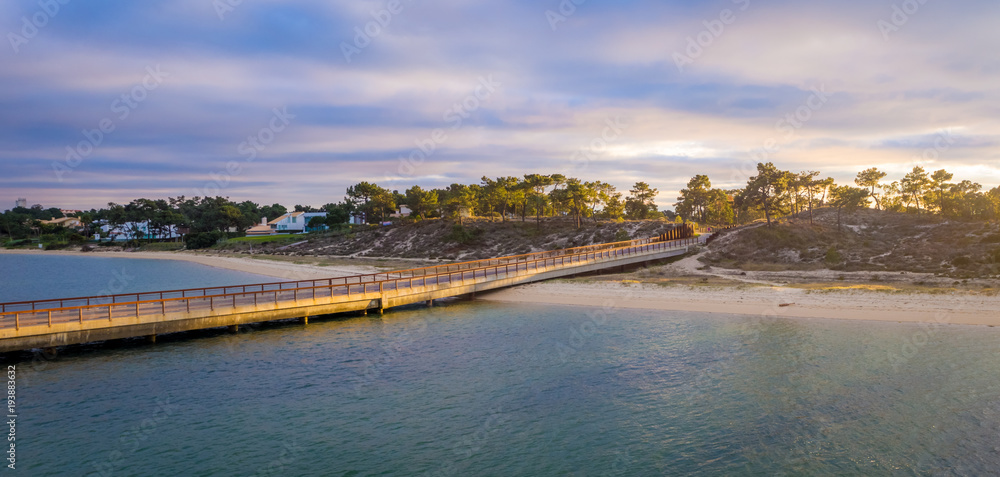 Fototapeta premium Tropical bridge at sunset