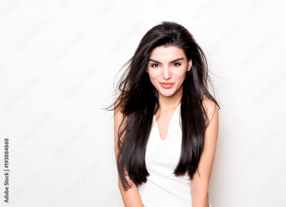 beautiful young woman with long black hair posing in white dress beautiful young woman with long black hair posing in white dress