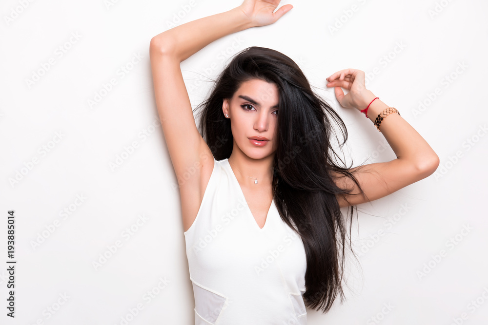 beautiful young woman with long black hair posing in white dress beautiful young woman with long black hair posing in white dress