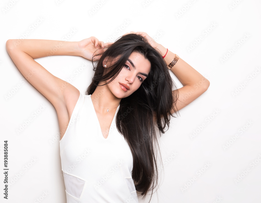beautiful young woman with long black hair posing in white dress beautiful young woman with long black hair posing in white dress