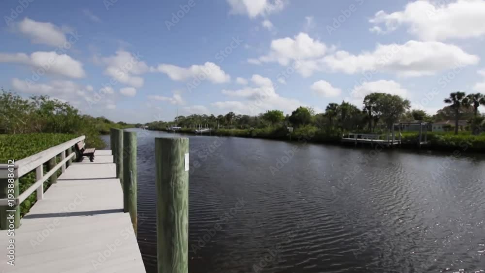 boardwalk with wooden post in florida boardwalk with wooden post in florida