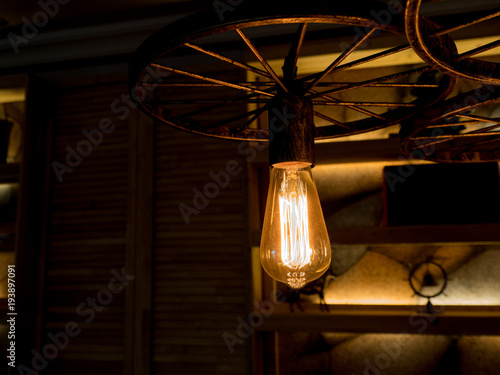 Several hanging lights with retro bulbs.