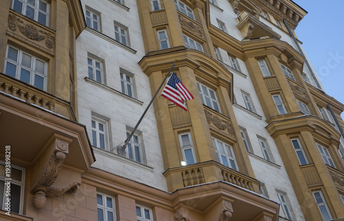 The US national flag on the building of the Embassy of the United States of America in Moscow. photo