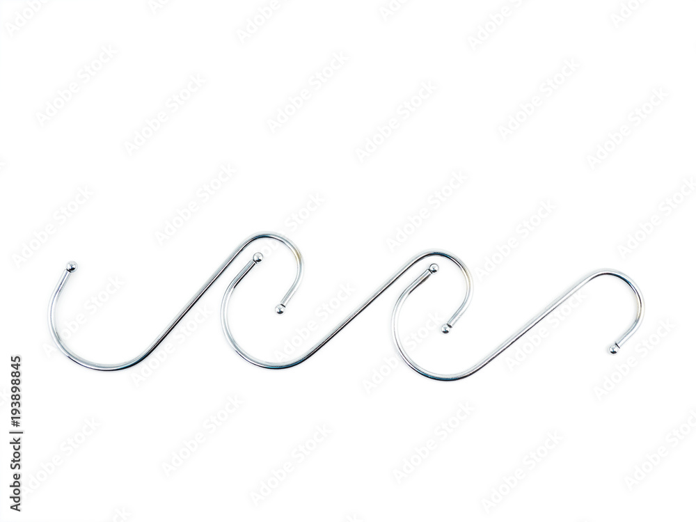 S-shape metal hook isolated on white background. S-shape metal hook isolated on white background.