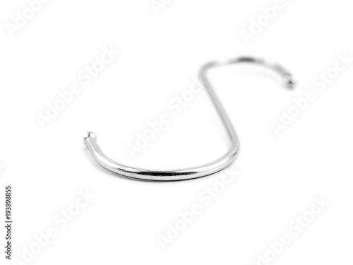 S-shape metal hook isolated on white background.