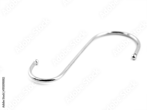 S-shape metal hook isolated on white background.