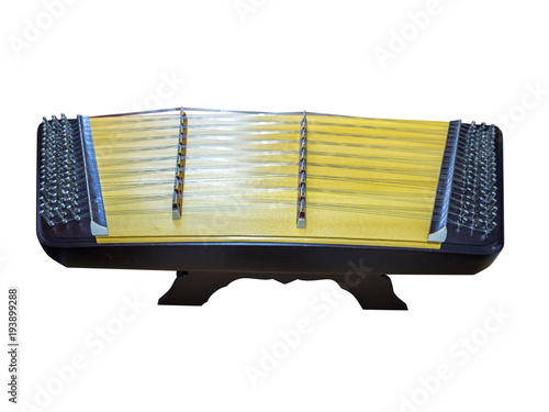 Thai traditional music instrument called zither isolated on white background including clipping path.