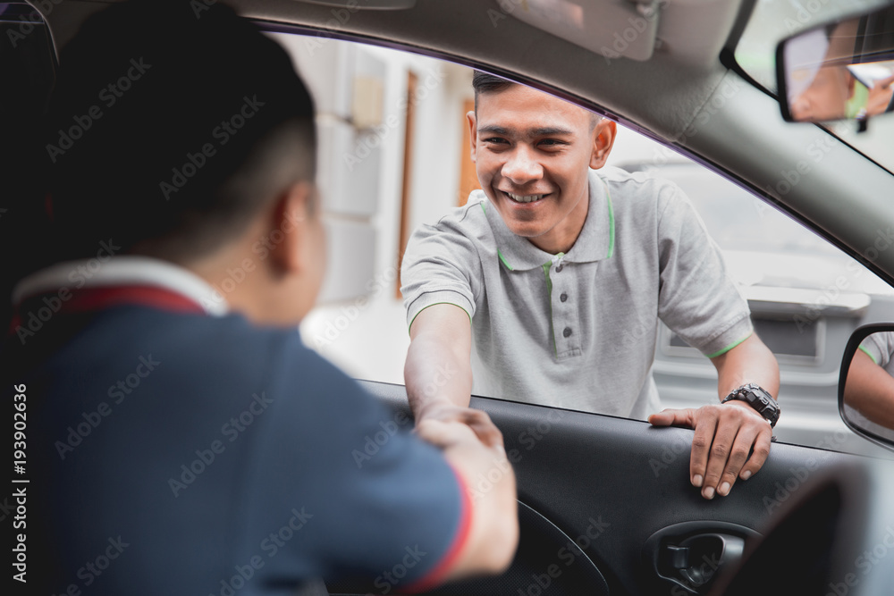 man driver shake hand man driver shake hand