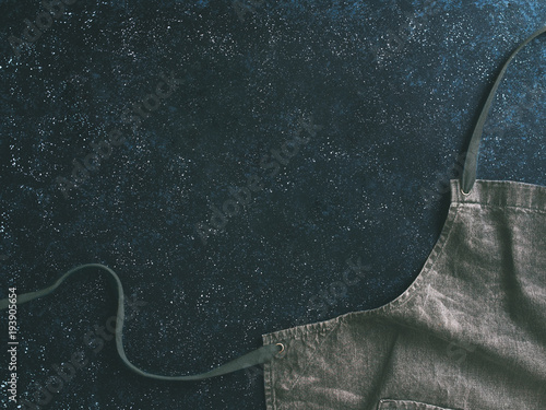 Slika na platnu denim cotton apron on dark background, copy space