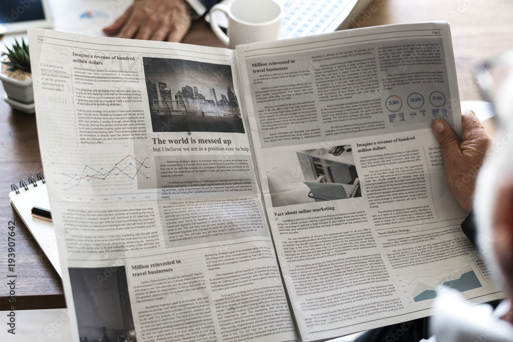 Naklejka premium Business people reading newspaper