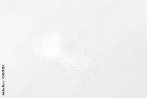 Some salt was placed on a white background.
