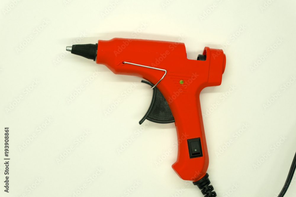 New glue gun isolated on white background cutout . New glue gun isolated on white background cutout .
