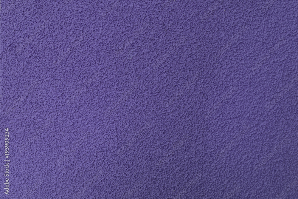Fototapeta premium Smooth background. Texture. A small impressed uneven relief pattern. Bright light purple color.