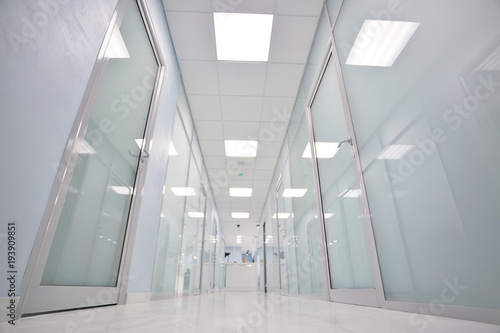 modern offices corridor, new bright building, spacious bright office premises, corridor light blurred background