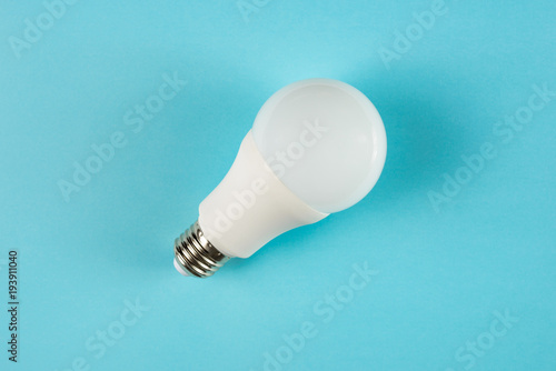 LED light bulb E27 on blue background