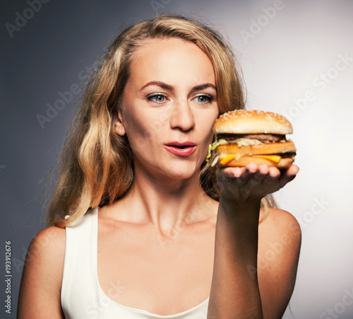 Female with hamburger